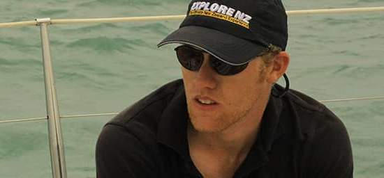 Man sitting on a boat wearing Bigatmo sunglasses-Polarized-lens and a baseball cap