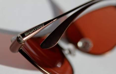Folded sunglasses showing Bigatmo logo on temple arm