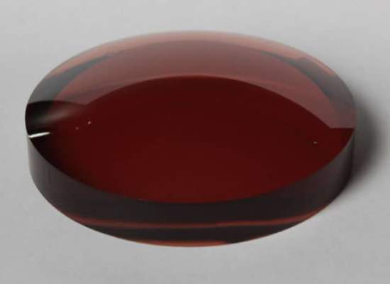 A Semi- Finished Blank prescription Alutra Lens, before it has been processed
