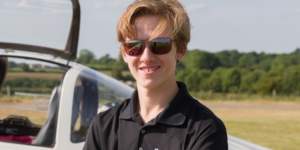 Travis Ludlow with his Piper 28